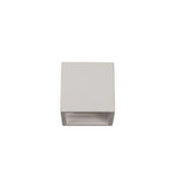 Alina G9 square wall light in white paintable gypsum, a compact cube-shaped fixture with a downward light slot, shown from above on a plain background.