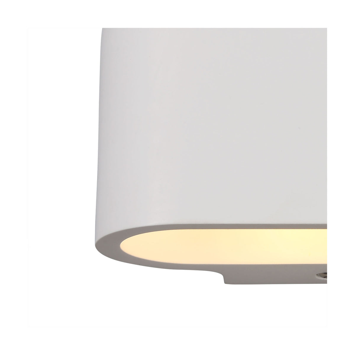 Close-up of the Alina G9 Oval Wall Light in white paintable gypsum, showing its smooth curved edge and downward light spill against a plain white background.