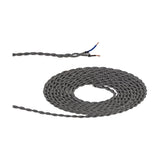 Cavo Wave Stripe Braided Twisted Cable, a coiled 2-core 0.75mm fabric flex in black with white wave pattern, one end stripped to show blue and brown copper cores, on a plain white background.