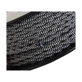 Cavo Wave Stripe Braided Twisted Cable, 2-core 0.75mm fabric flex in black with white zigzag pattern, shown wound on a spool.
