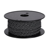 Spool of Cavo braided twisted copper cable, 2 core 0.75mm, black and white fabric weave on a black reel against a plain white background.