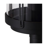 Close-up of the Reva IP44 E27 lamp post head in black aluminium with a clear polycarbonate cylinder, cage-style bars and a visible fixing screw on a white background.