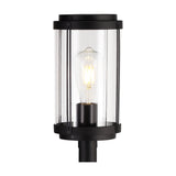 Reva IP44 E27 Lamp Post in black with a cylindrical clear polycarbonate diffuser, vertical bar details, and a lit ST64 filament bulb, shown against a plain white background.