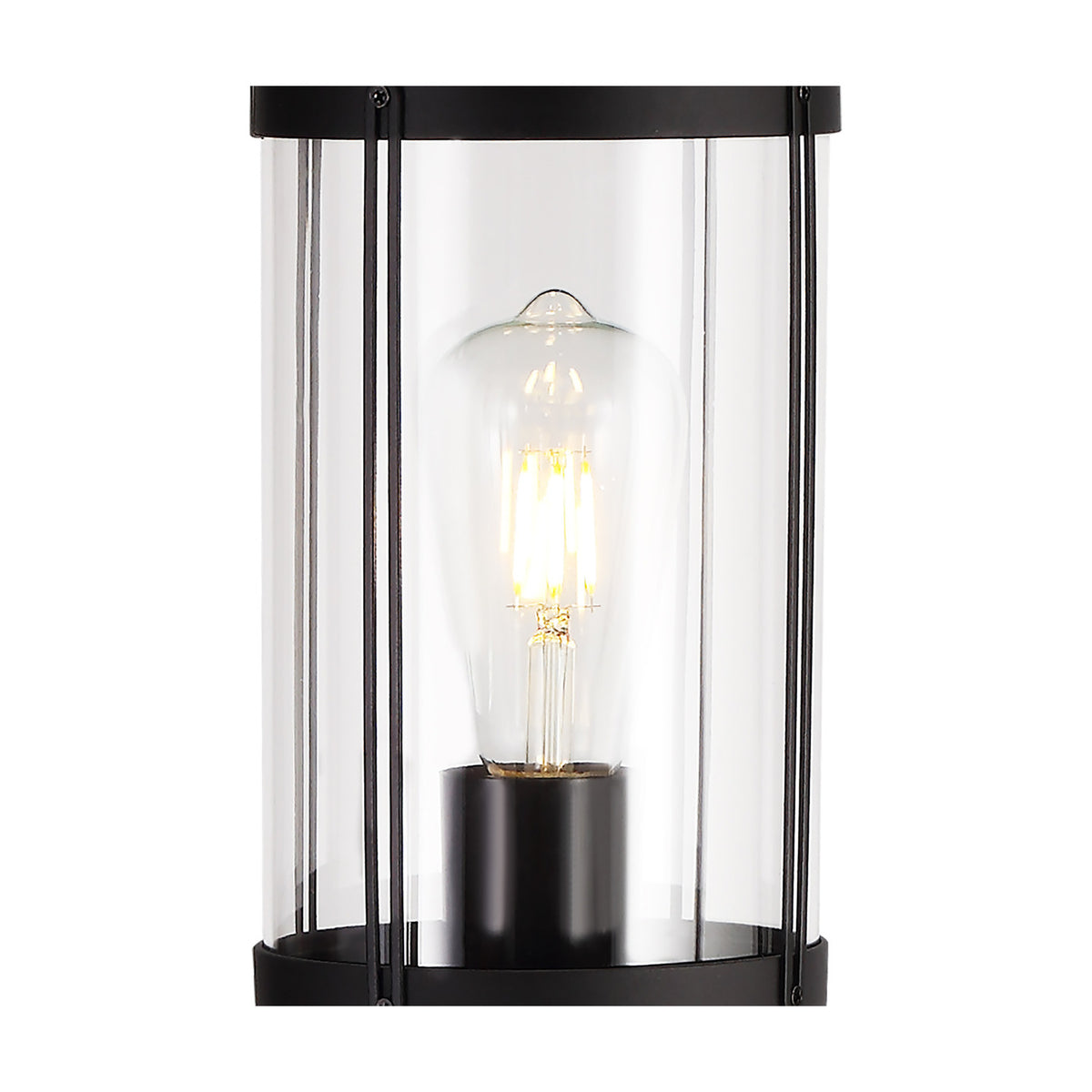 Close-up of the Reva IP44 E27 lamp post's black metal frame and clear polycarbonate diffuser, showing a lit ST64 filament bulb inside on a white background.