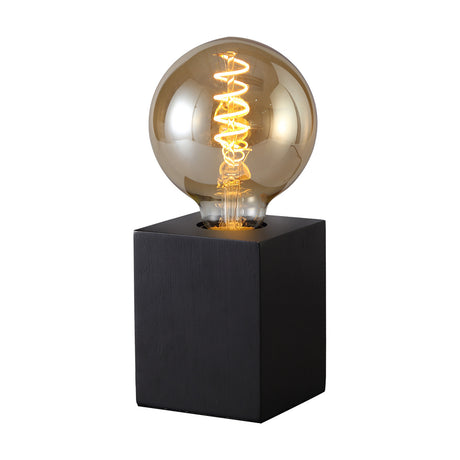 Aida E27 Table Lamp in black with a small square wooden base and exposed E27 socket holding a large globe filament bulb, shown on a plain white background.