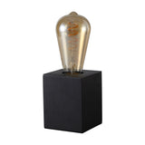 Aida E27 Table Lamp in black with a small square wooden base and exposed E27 socket holding a decorative amber Edison-style bulb, shown on a plain white background.