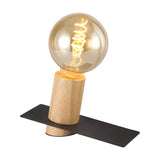 Bret E27 table lamp with black flat base and wood cylindrical socket holder, fitted with a large amber globe filament bulb, shown on a plain white background.