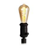 Kork E27 Table Lamp 60mm in black iron with an ST64 filament bulb and rotary switch, shown on a plain white background.