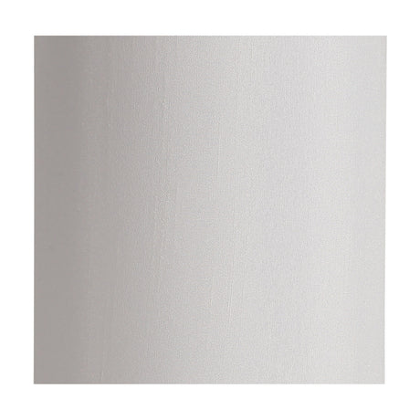 Serena Lamp Shade 12cm in white faux silk, a slim upright cylinder drum with soft sheen and white lining, shown on a plain light background.