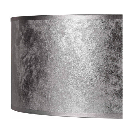 Close-up of the Sigma Cylinder Lamp Shade 40cm in silver foil PVC, showing its textured metallic finish and soft sheen against a plain white background.