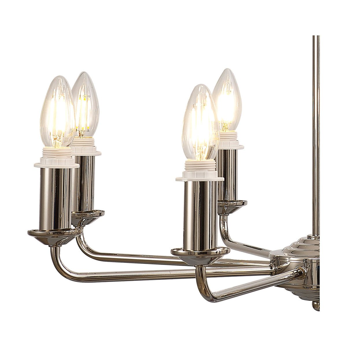 Close-up of the Banyan semi flush ceiling light in champagne gold, showing curved iron arms with candle-style E14 bulbs against a white background.