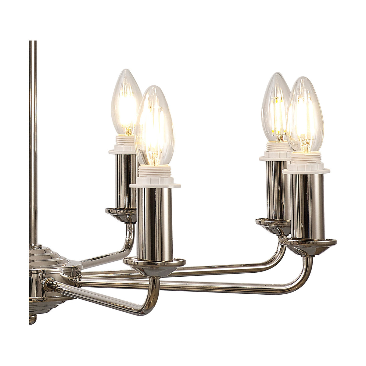 Close-up of the Banyan semi-flush ceiling light's champagne gold arms with lit E14 candle bulbs in white holders, shown against a plain white background.
