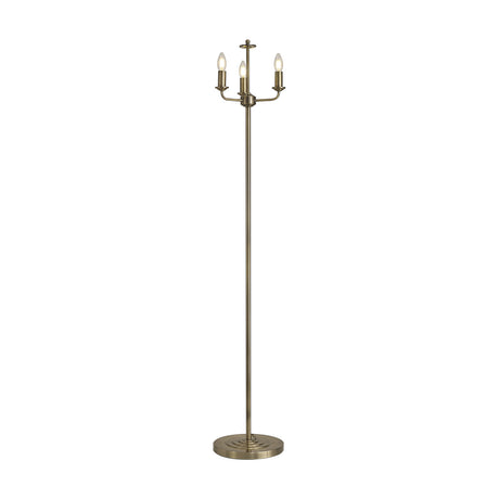 Banyan 3 Light E14 Floor Lamp in antique brass, with three candle-style arms atop a slim iron column and a round base, on a plain white background.