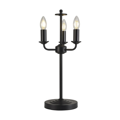 Banyan 3 Light E14 Table Lamp in matt black iron, three candle-style arms on a round base with clear filament bulbs, no shades, on a plain white background.