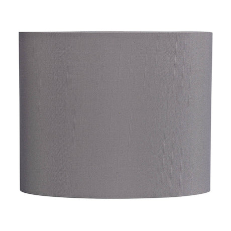 Serena Oval Lamp Shade in grey faux silk with subtle woven texture, flattened oval shape, white lining inside, shown on a plain white background.