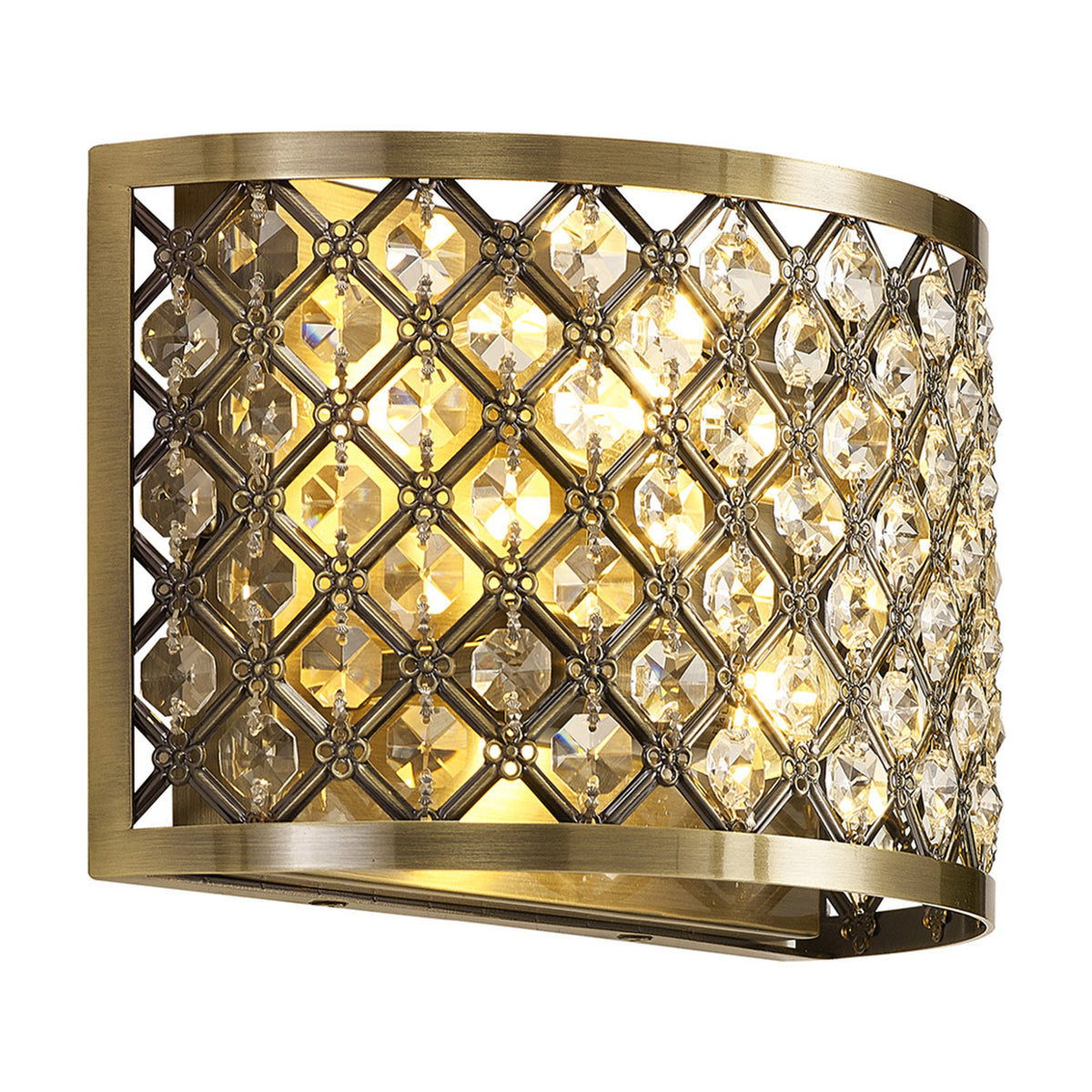Sasha 2 Light E14 Wall Light in Antique Brass, a curved half-drum fixture with a lattice of clear faceted crystals, shown lit against a plain white background.