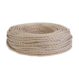 Cavo Braided Twisted Copper Cable, 3 core 0.75mm ivory fabric flex coiled into a tight bundle, shown on a plain white background.