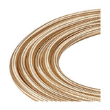 Cavo Braided Copper Cable, a 3 core 0.75mm gold fabric flex coiled to show its woven texture and slim 6mm profile, shot on a plain white background.