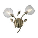 Elm G9 2 Shade Wall Light in antique brass with two clear glass globe shades on curved arms, decorative leaf details, and a round wall mount, shown on a plain white background.