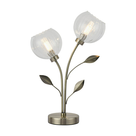 Elm 2 Light G9 Table Lamp in antique brass with clear ribbed glass globe shades and leaf detailing on a round base, shown on a plain white background.