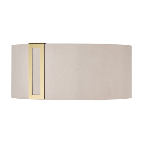 Sigma Lamp Shade 15cm High in Antique Brass, a compact oval drum shade in cream fabric with a narrow brushed brass back plate, shown against a plain white background.