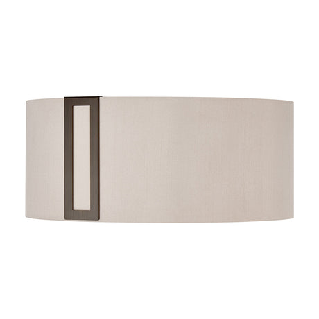 Sigma Lamp Shade 15cm High in Bronze, an oval drum-style shade in beige fabric with a narrow bronze vertical trim detail, shown on a plain white background.
