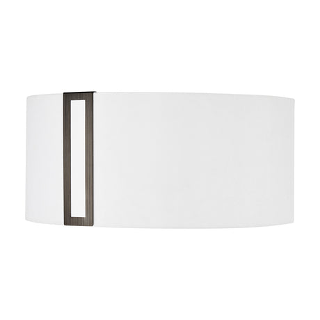 Sigma Lamp Shade 17cm High in white fabric with an oval drum silhouette, finished with a slim upright bronze steel clip detail on one side, shown against a plain white background.