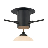 Close-up of the Addie 3 Light G9 Flush Ceiling Light in satin black, showing the circular backplate, cylindrical body, and one opal glass globe shade on a plain white background.