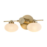 Addie 2 Light G9 Wall Light in antique brass, with a horizontal bar holding two oval opal glass shades, shown lit against a plain white background.