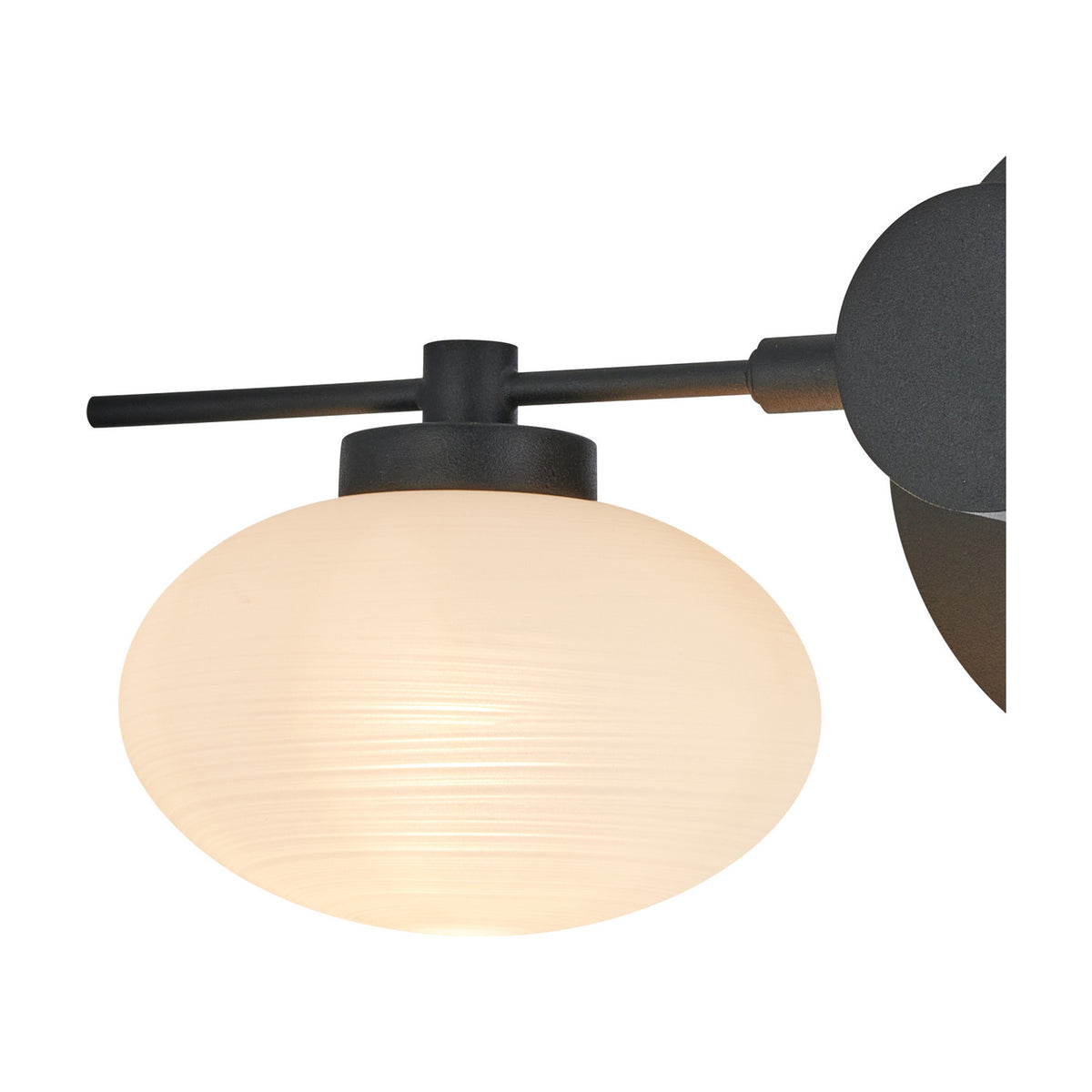 Close-up of the Addie 2 Light G9 Wall Light in satin black, showing an oval opal glass shade illuminated on a slim black arm against a white background.