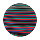 Close-up of Cavo 4 core copper cable for RGB LED strips, 0.5mm PVC-coated wires in red, blue, green and black, coiled in circular arrangement on white background.