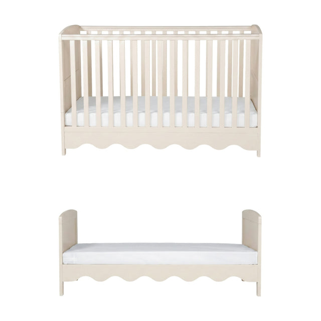 Dancer Convertible Cot Bed & 3 Position Base in cashmere finish, shown as a slatted cot with scalloped base and as a toddler bed with headboard and footboard, on a white background.