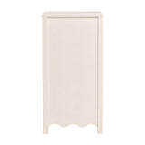 Side view of the Dancer changing table in cashmere, showing the MDF cabinet with a scalloped bottom edge, set against a plain white background.