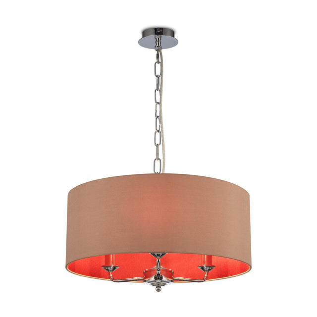 Banyan 3 Light Pendant Light, 50cm drum shade in antique gold with a ruby-toned inner lining, polished chrome fittings and chain suspension, on a plain white background.