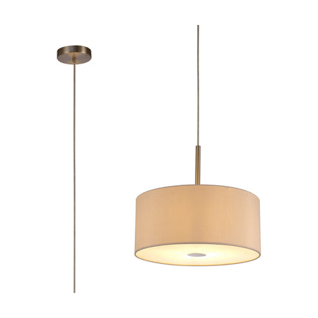 Baymont Pendant Light with nude beige drum shade, satin nickel ceiling cup and rod, frosted diffuser base, shown on a plain white background.