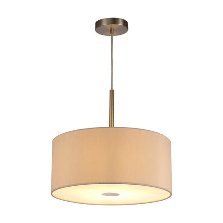 Baymont Pendant Light with a nude beige fabric drum shade, satin nickel ceiling cup and rod, and frosted acrylic diffuser at the base, shown on a plain white background.