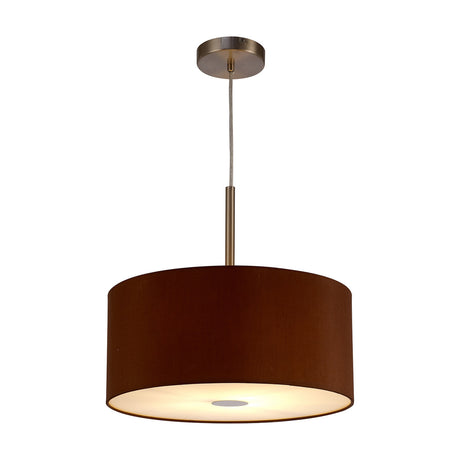 Baymont Pendant Light with a raw cocoa fabric drum shade, satin nickel suspension rod and ceiling rose, frosted diffuser underneath, shown lit against a plain white background.