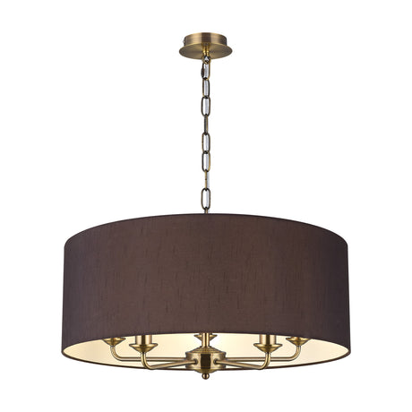 Banyan 5 Light E14 pendant light with a 60cm black drum shade and five candle arms in antique brass finish, shown on a plain white background.