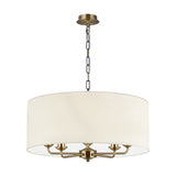 Banyan 5 light E14 pendant light with a 60cm ivory pearl drum shade and five candle-style arms in antique brass, on a plain white background.