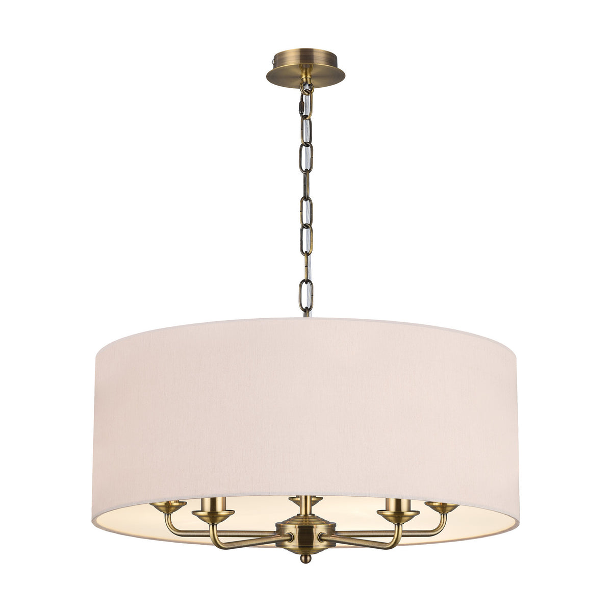 Banyan 5 Light E14 Pendant Light with wide nude beige drum shade and five arms on an antique brass stem and chain, shown on a plain white background.