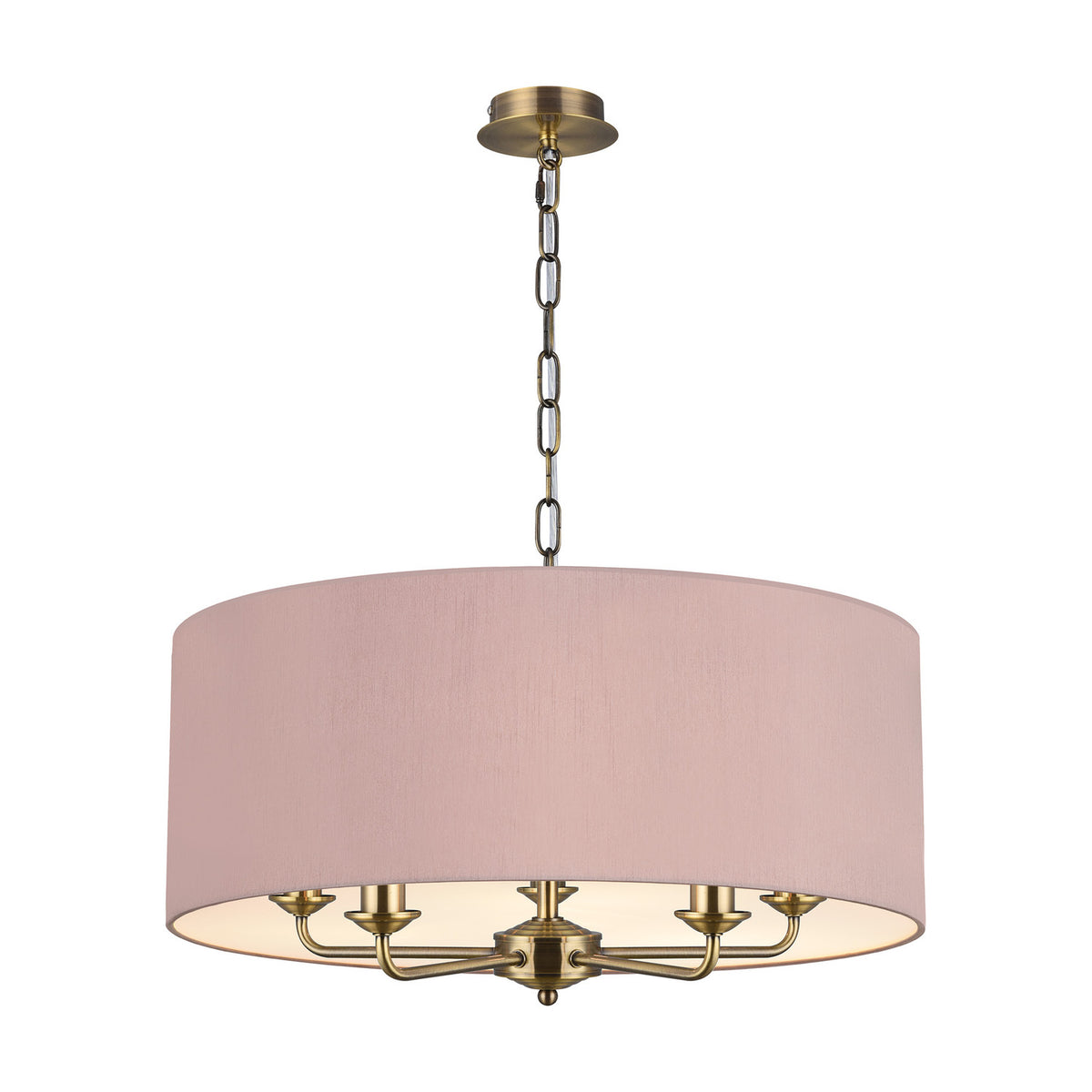 Banyan 5-light E14 pendant in antique brass with curved candle arms beneath a 60cm taupe drum shade with gold lining, chain suspension, shown on a white background.
