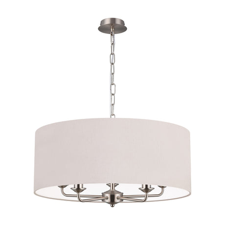 Banyan 5 Light E14 pendant light with a large nude beige drum shade and five satin nickel arms, hung on a chain, shown on a plain white background.