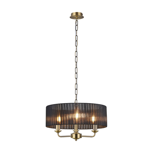 Banyan 3 Light E14 Pendant Light in antique brass with a 45cm black organza drum shade, three candle-style arms, and a chain suspension, shown on a white background.