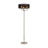 Banyan 3 Light E14 Floor Lamp with a wide black organza drum shade and slim polished nickel stem on a round base, set against a plain white background.