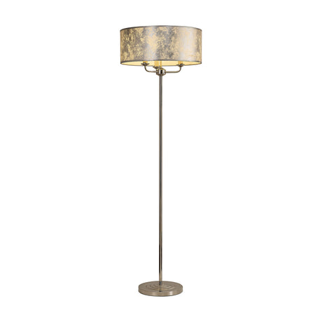 Banyan 3 Light E14 Floor Lamp in polished nickel with a slim stem, round base, and a 50cm wide drum shade in silvery foil, shown on a plain white background.