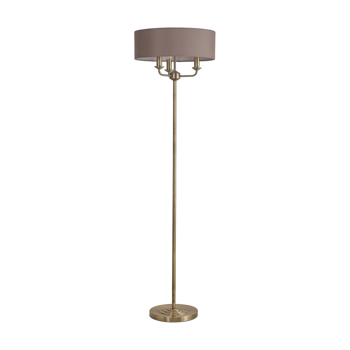 Banyan 3 Light E14 floor lamp with a slim antique brass column, three candle lights, and a 45cm grey faux silk drum shade, shown on a round brass base against a plain white background.