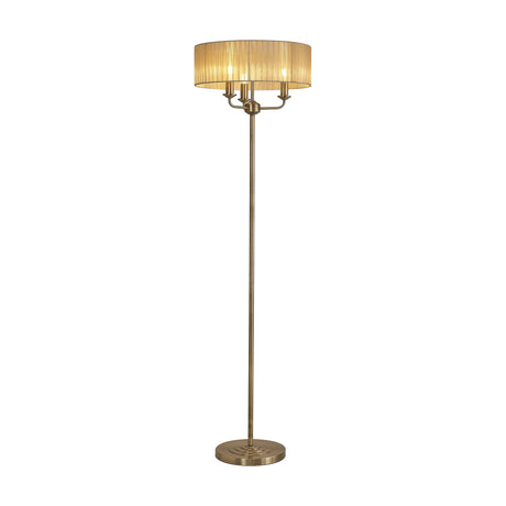 Banyan 3 Light E14 Floor Lamp with soft bronze organza drum shade, antique brass stand and base, 45cm shade, on a plain white background.