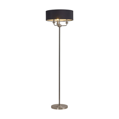 Banyan 3 Light E14 floor lamp with a black faux silk drum shade on a slim satin nickel column and round weighted base, shown on a plain white background.