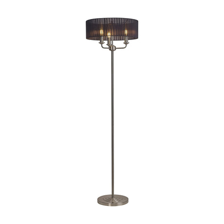 Banyan 3 Light E14 floor lamp with slim satin nickel stem, round base, and a wide black organza drum shade revealing three candle bulbs, shown on a white background.