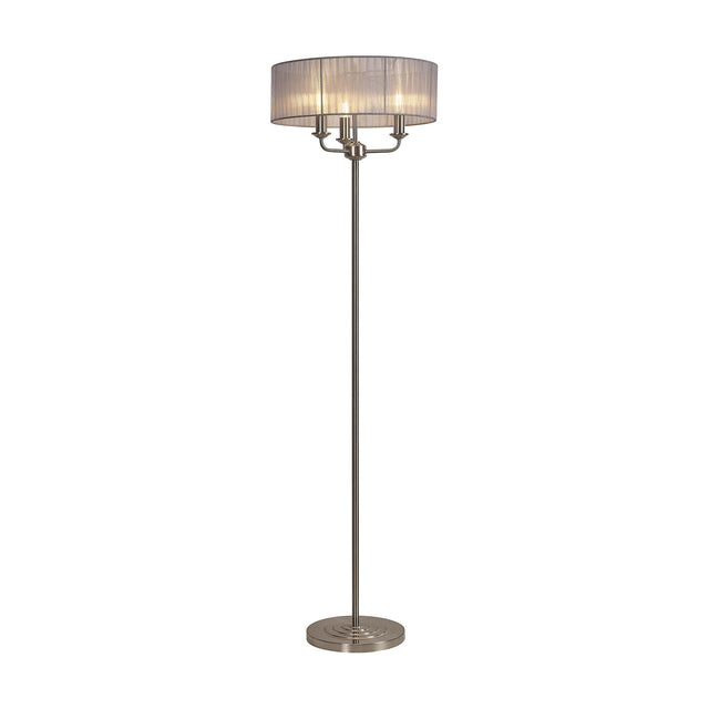 Banyan 3 Light E14 floor lamp with a wide grey organza drum shade on a slender satin nickel stem and stepped round base, shown on a plain white background.